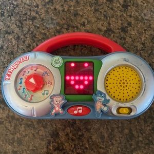 Used Leap Frog magnetic fridge DJ for all ages. Sings numbers, abc’s & songs